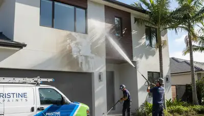 Professional pressure cleaning house exterior in Reading, MA by expert local painters